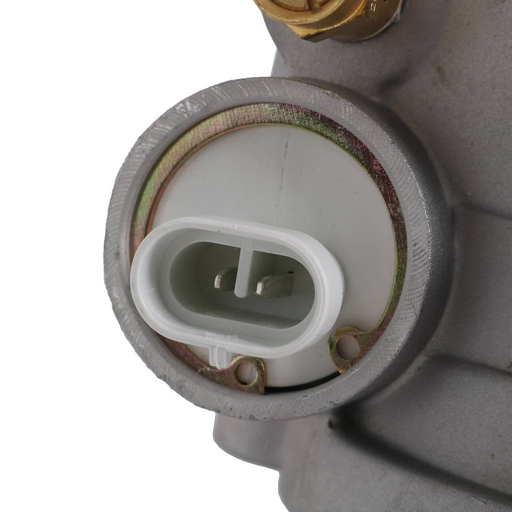 Air dryer inlet connection with white connector and metal gasket on silver housing