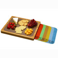 Bamboo serving tray with built-in mat storage, showing assorted cheese and fruit