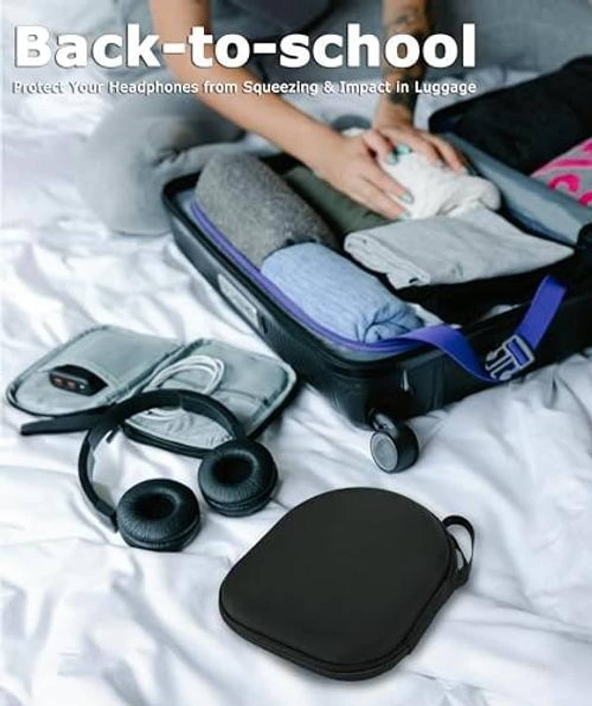 Black zip headphone case with spare ear cushions and cable accessories inside