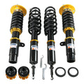 Coilover suspension kit with black springs and gold adjustable top hats