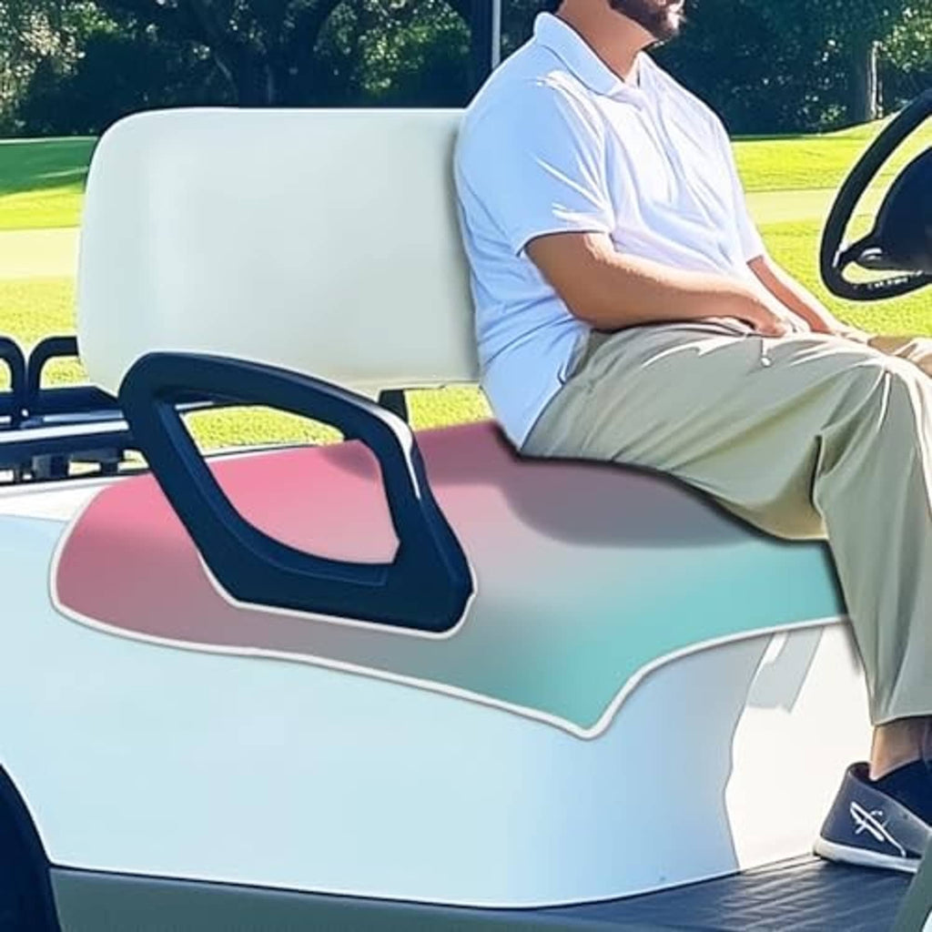 Golf cart seat cover towel in pink-to-teal ombre microfiber on front bench with armrest