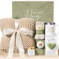 Sympathy gift basket with beige knitted throw, mug, candle, soap, and socks