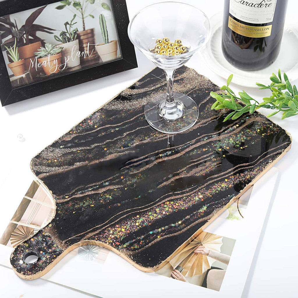Large rectangular silicone resin tray mold with wavy edges, dark with gold speckles