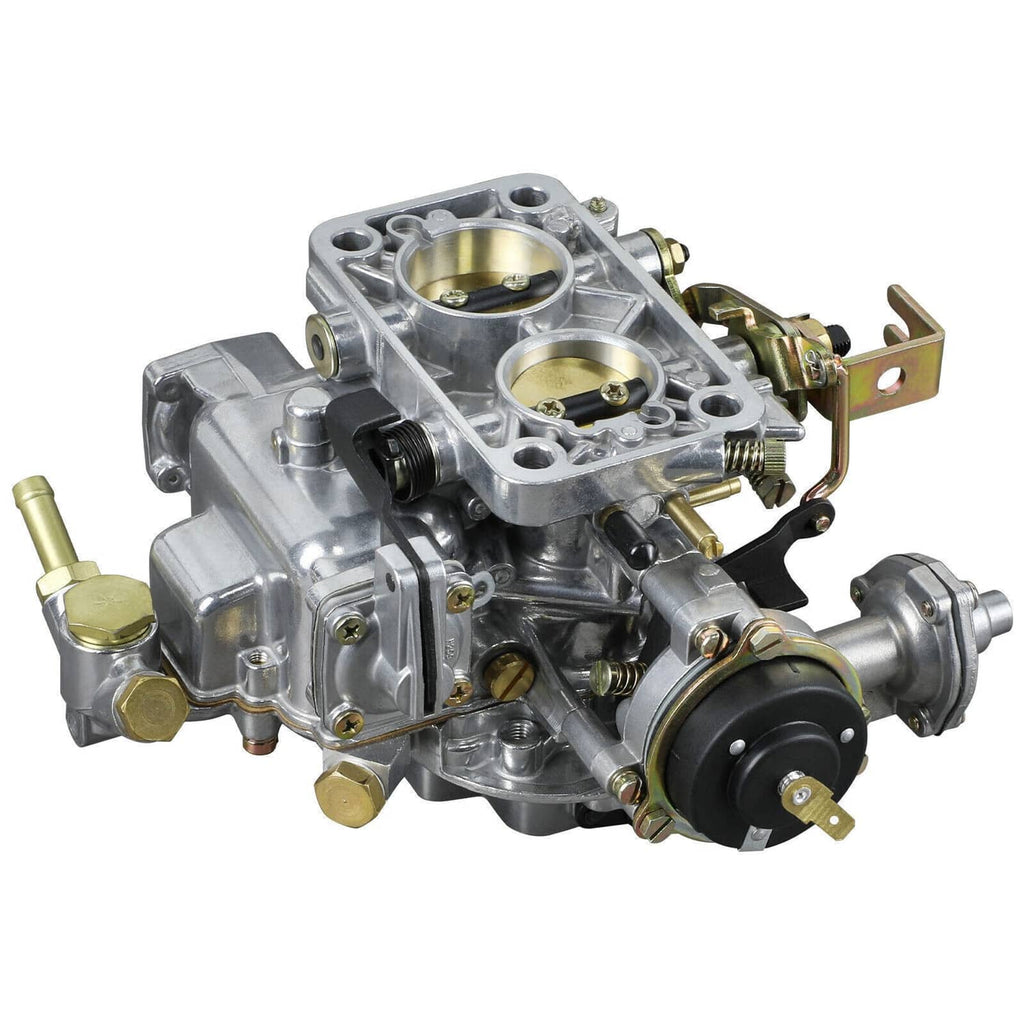 Two-barrel carburetor close-up with air horn, brass jets, and black vacuum housing.