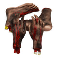 Set of severed hands and feet props, gray-brown limbs with red blood splatter and yellow tips
