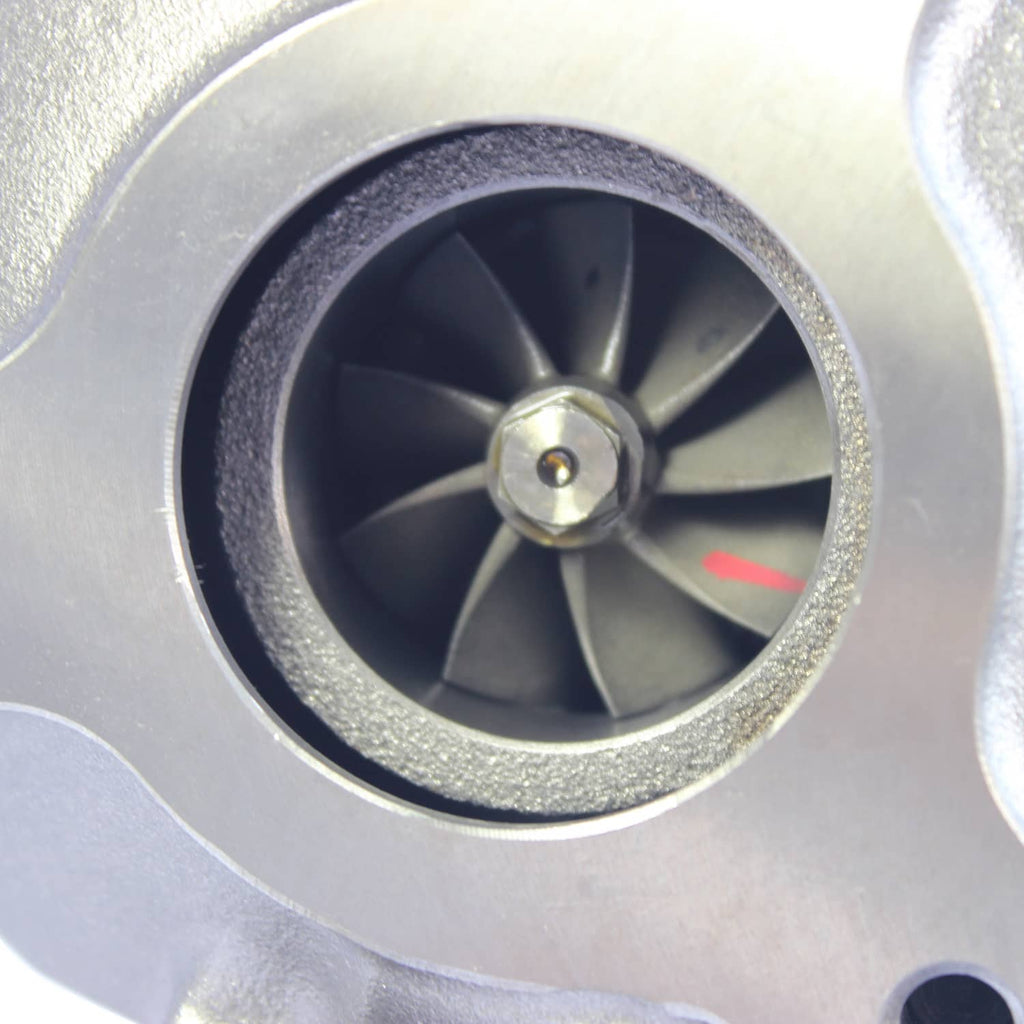Turbocharger turbine wheel inside metal housing