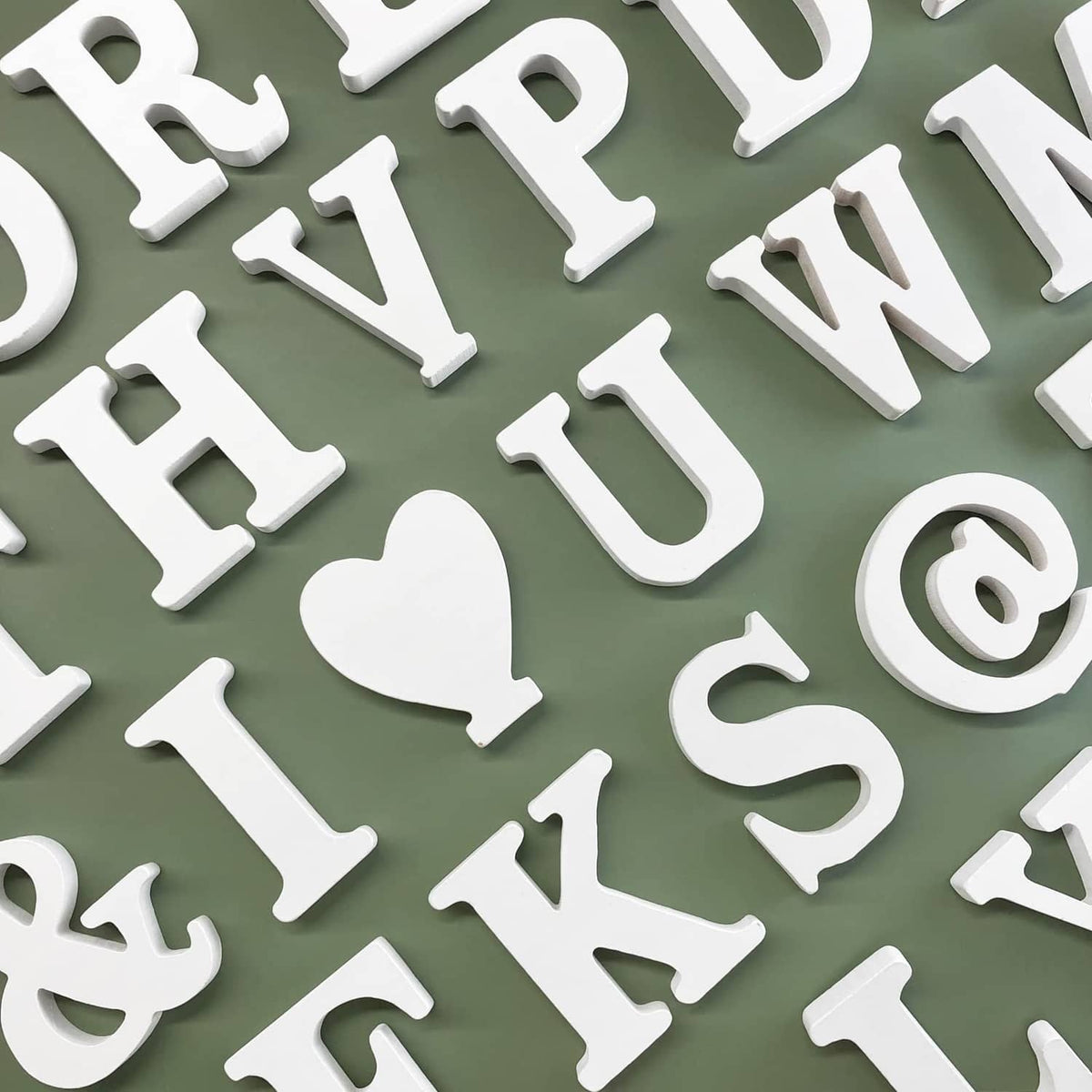 White wood marquee letter cutouts with raised 3D edges and thick unfinished look