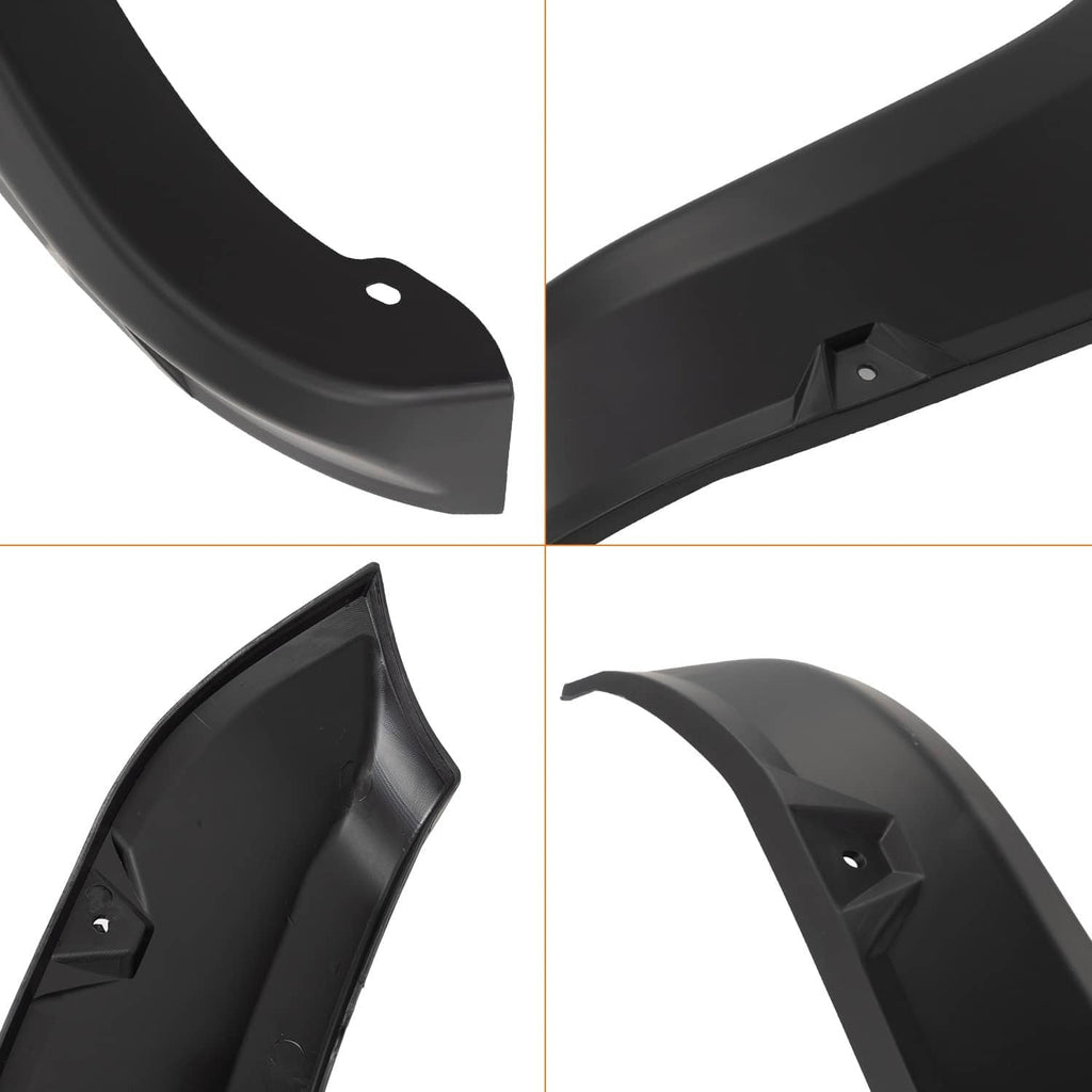 Close-up of black wheel fender flare with mounting holes and curved edge detail