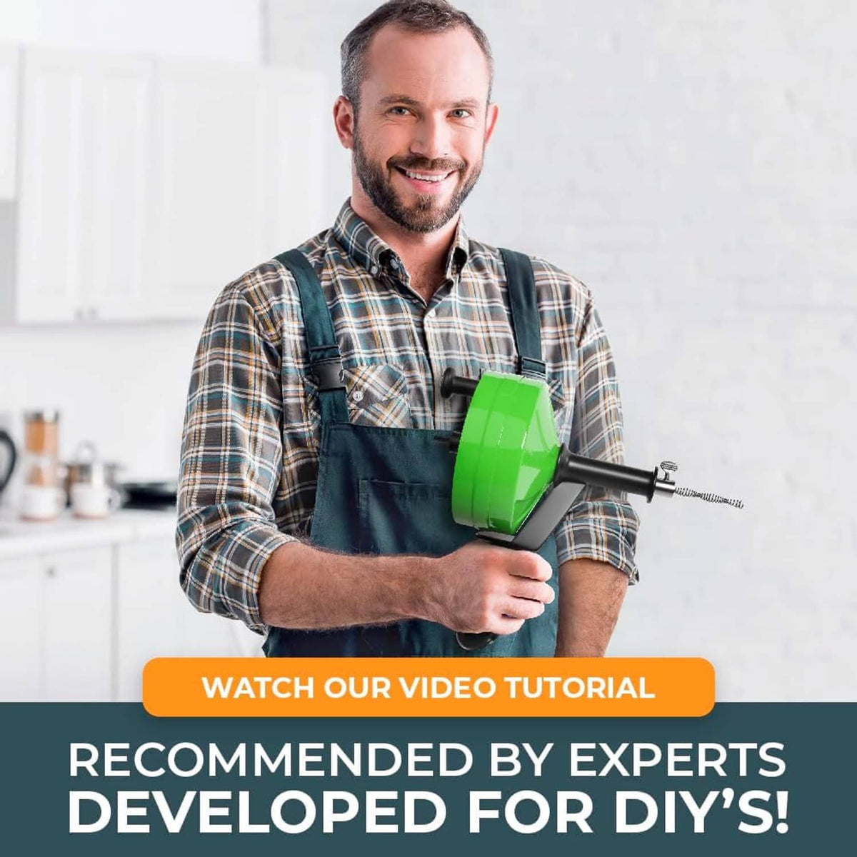 DIY plumber holding green drain snake tool with drill attachment and cable