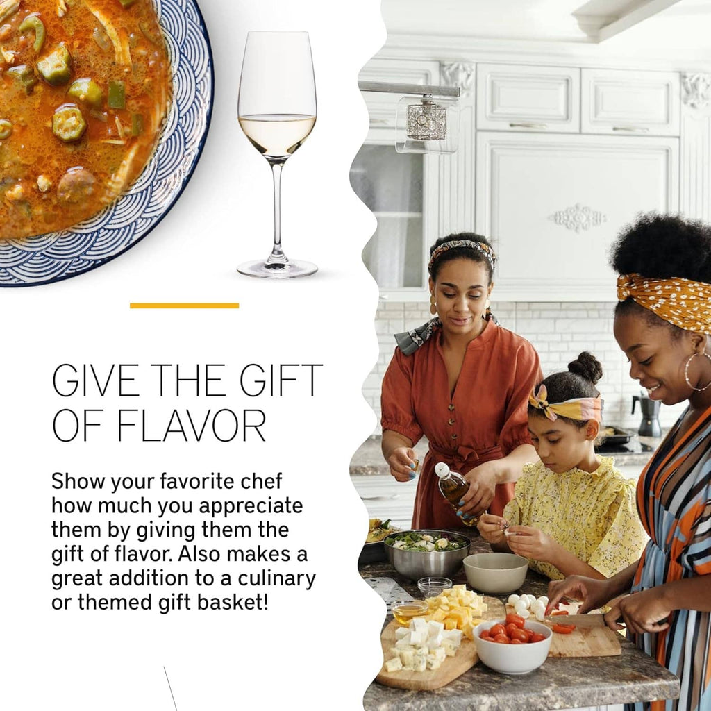 Orange-brown gumbo in a bowl with green okra pieces and a wine glass nearby