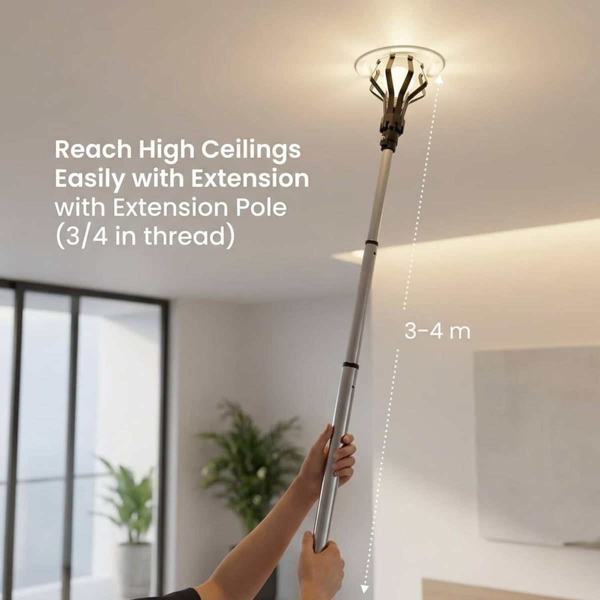 Black suction cup light bulb changer mounted on a white extension pole