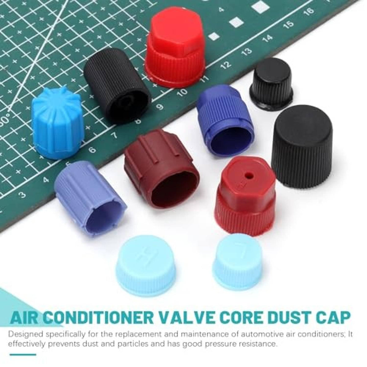 A/C valve core dust caps on measuring mat: red, black, blue, purple, and light blue