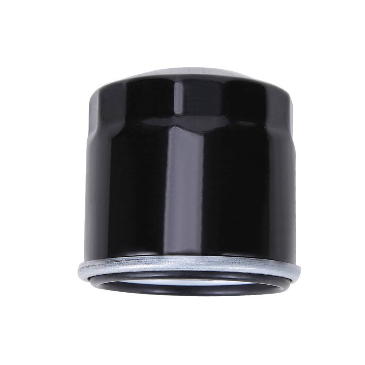 Oil filter cartridge end cap view with metal lip, dark housing