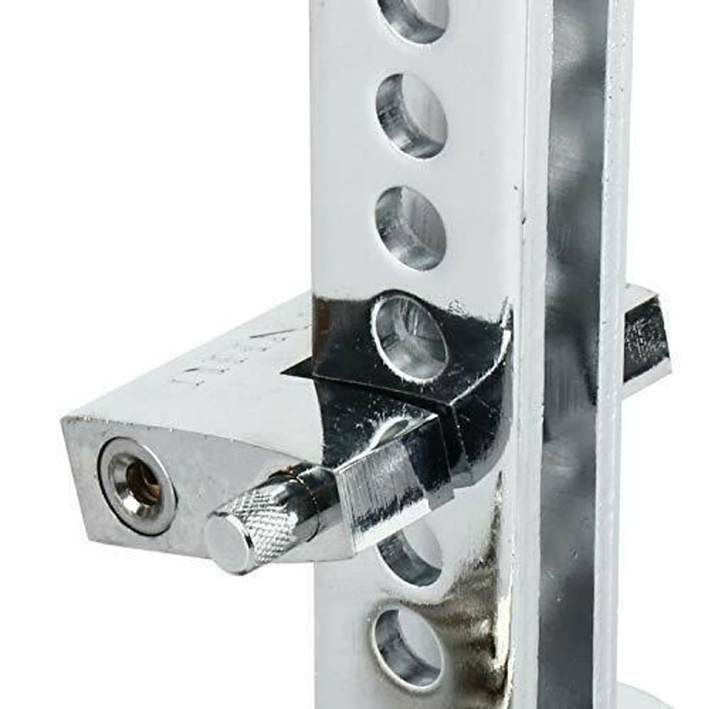 Close-up of steel pedal lock bracket with screw and locking contact plate