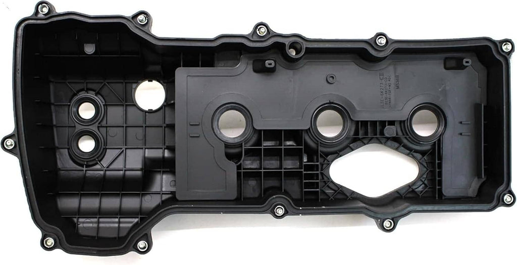 Left-side valve cover interior with gasket openings, baffles, and molded support ribs