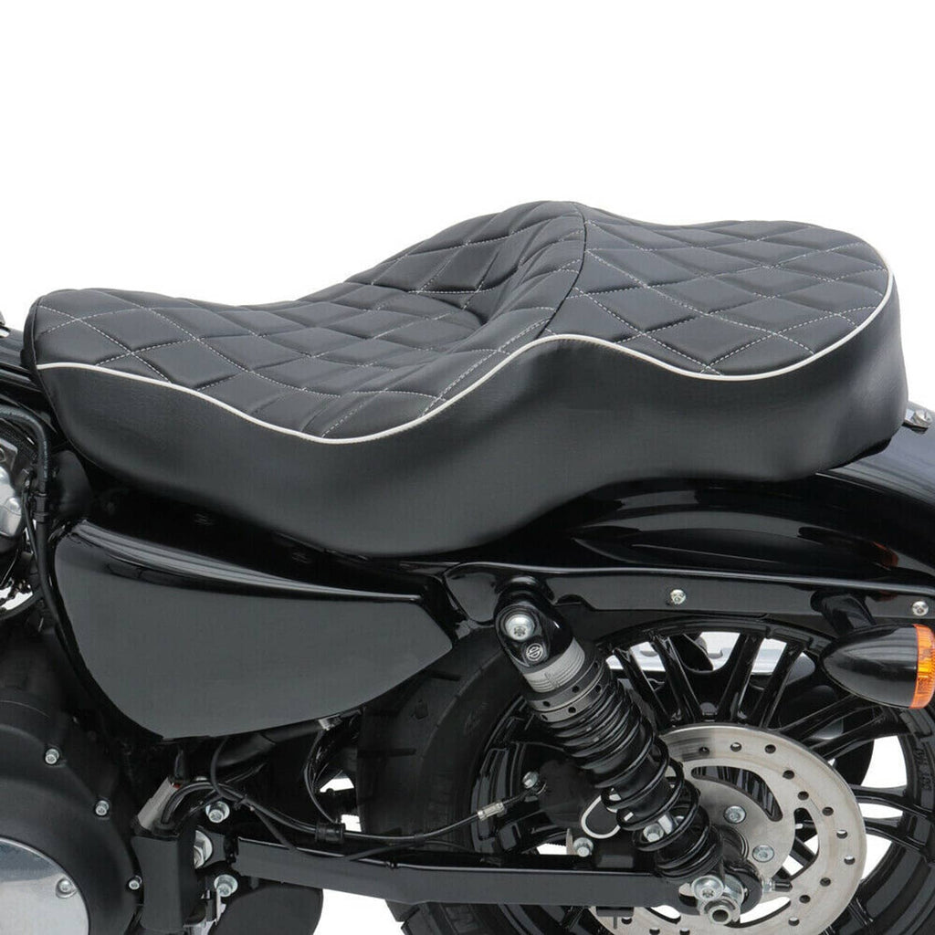 Two-up motorcycle seat cushion in black with diamond quilting and light piping