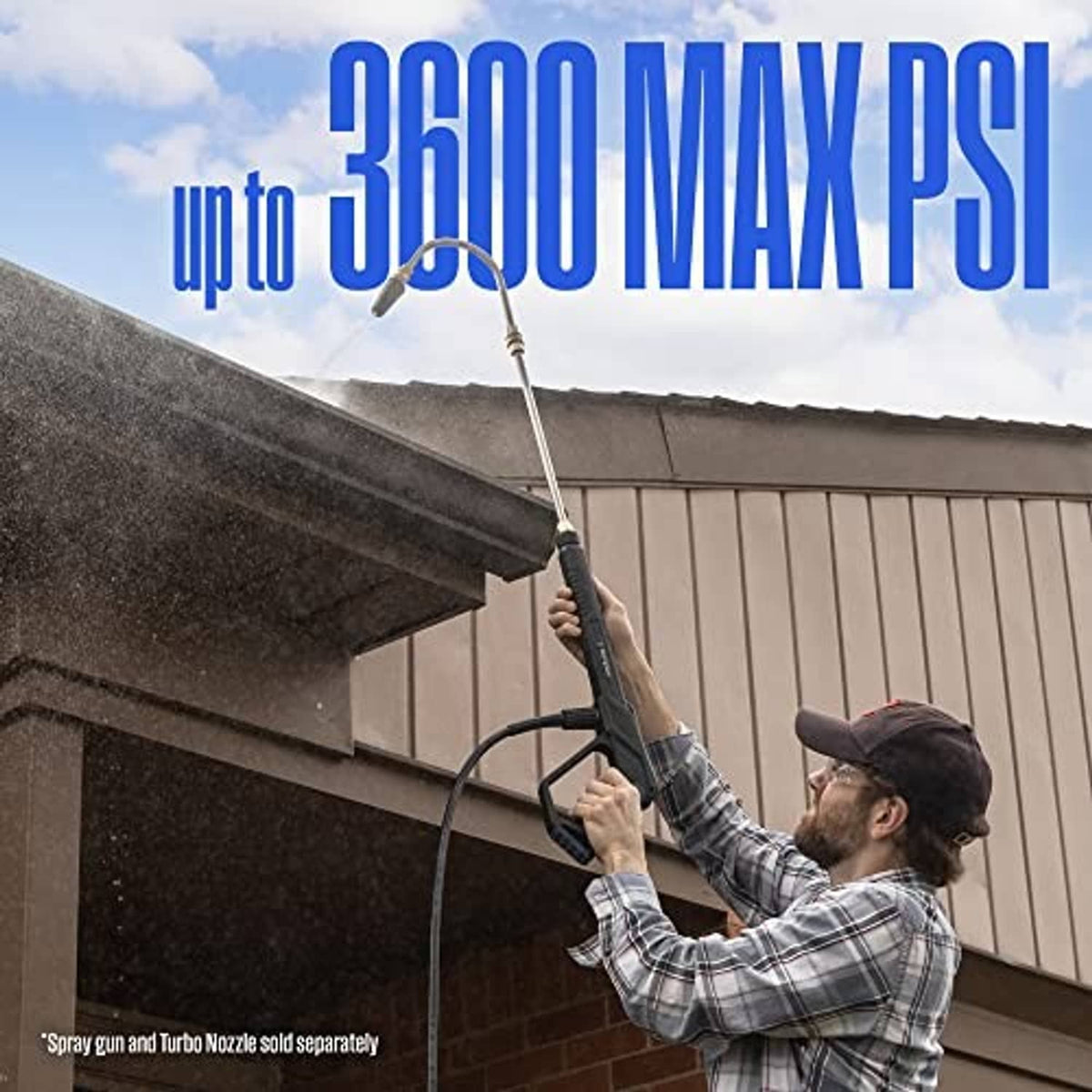 Pressure washer gutter-cleaning wand spraying under eaves; long lance with brass end fitting