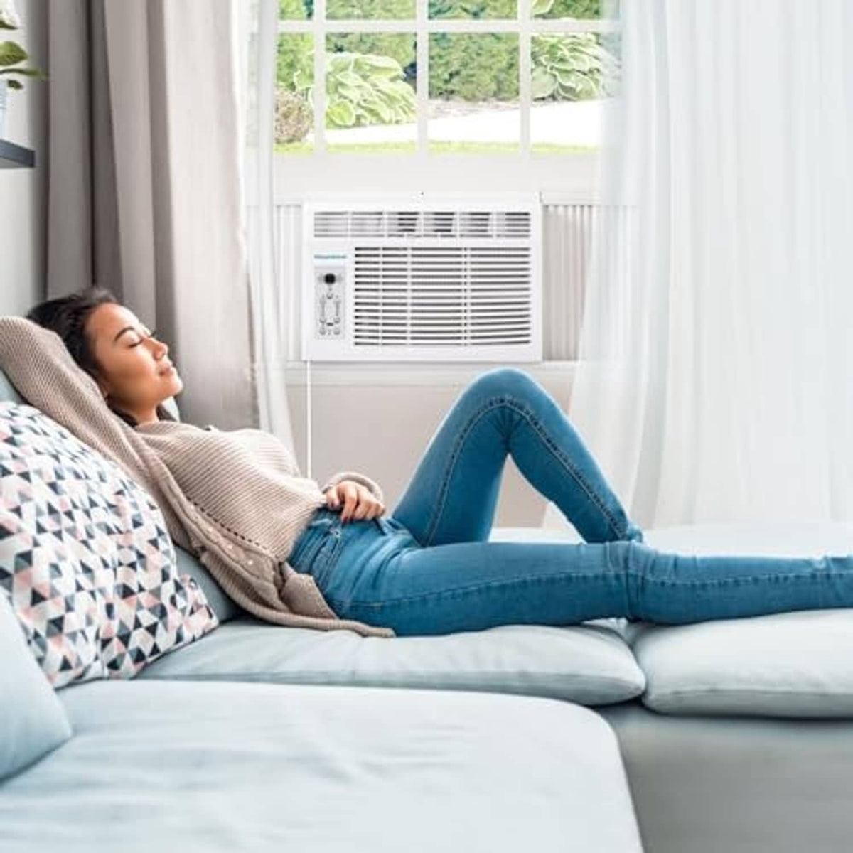 Window-mounted air conditioner unit installed in a window