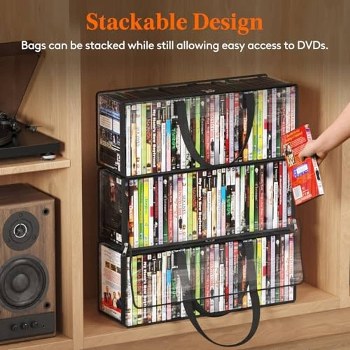Stackable set of clear PVC DVD storage bags with black handles on shelf