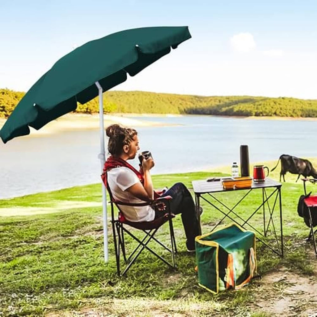 Green portable beach picnic umbrella with scalloped canopy on center pole