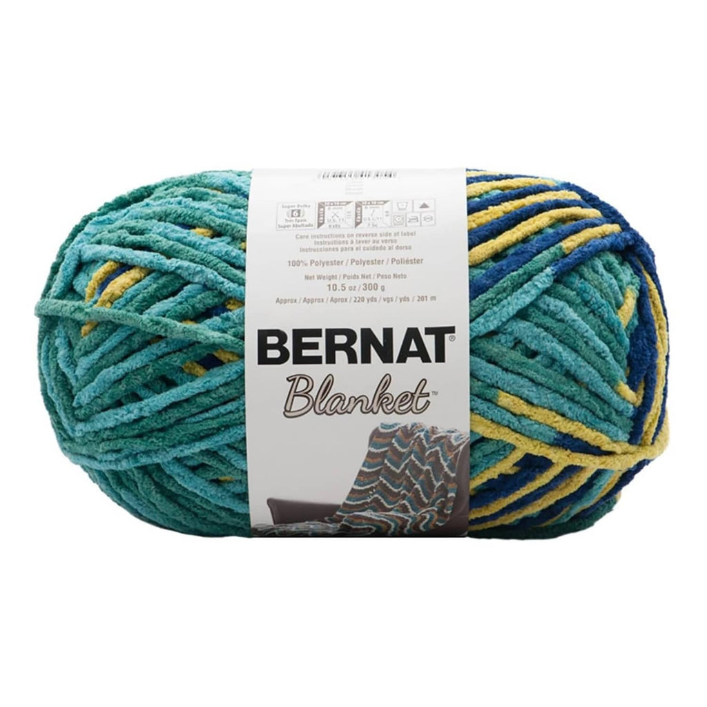 Variegated bulky acrylic yarn ball, teal and yellow stripes, Bernat Blanket label