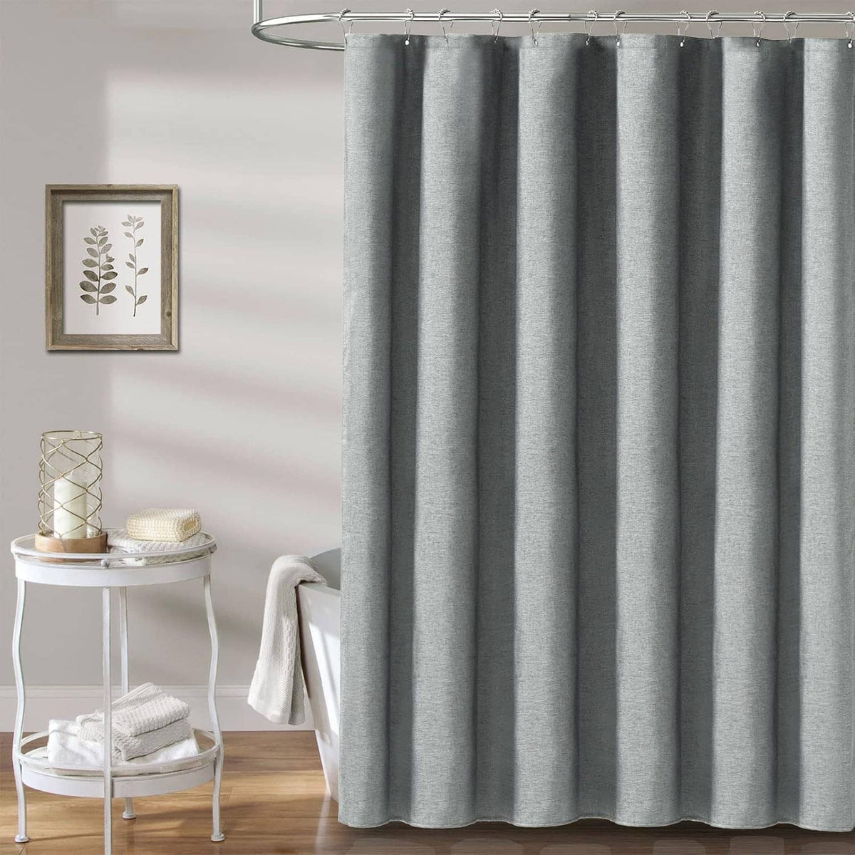 Grey linen-textured shower curtain with straight hanging folds and top metal grommets