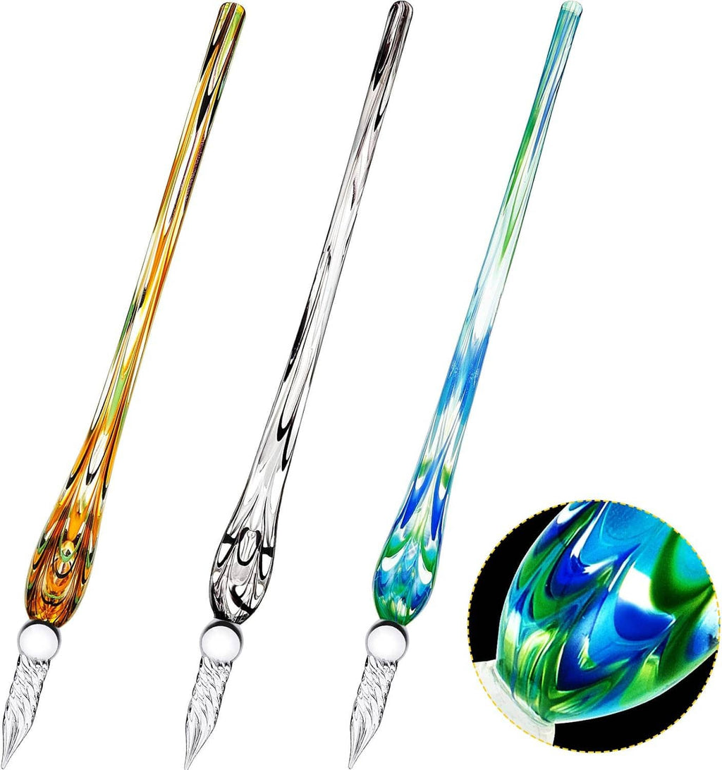 Set of 3 glass calligraphy dip pens with silver nibs, featuring colorful swirls on the barrels