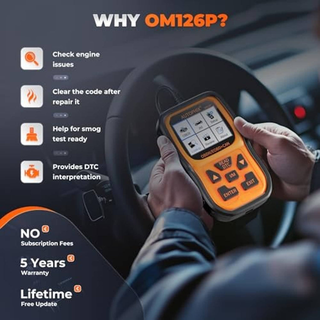 Hand holding orange OBD2 scanner on a steering wheel dashboard