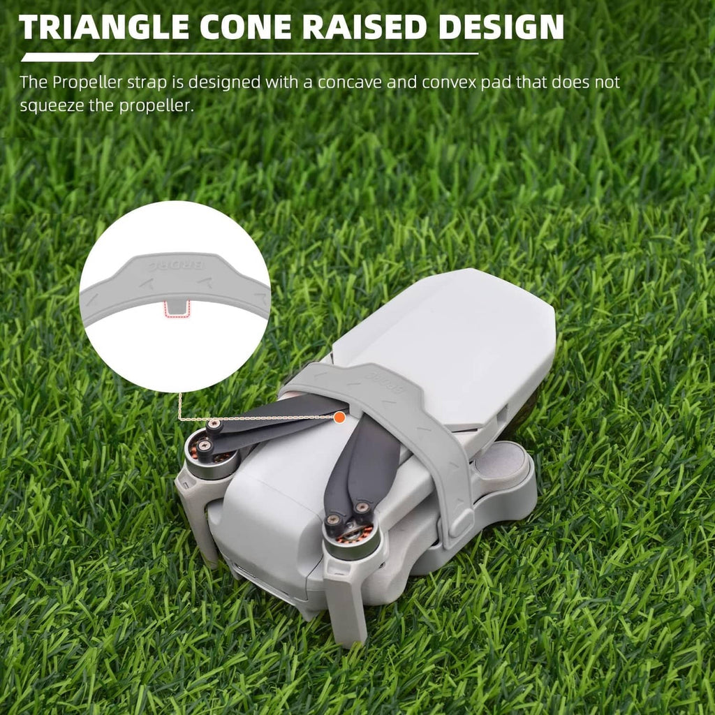 Drone propeller guard strap with raised pad detail on grass surface