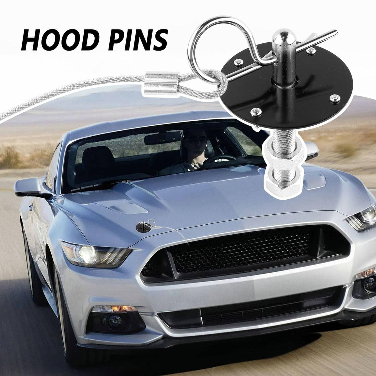 Installed hood pin kit on car hood: two black base plates with stainless pins and cable