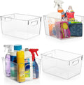 Set of clear plastic storage bins with side handles for pantry organization