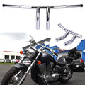 Chrome drag-style T-bar motorcycle handlebars with central riser and end grips
