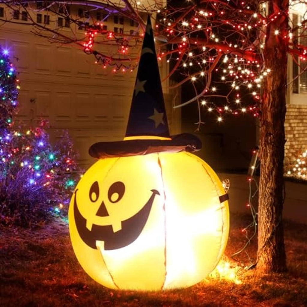 Inflatable Halloween pumpkin with glowing jack-o'-lantern face and black witch hat