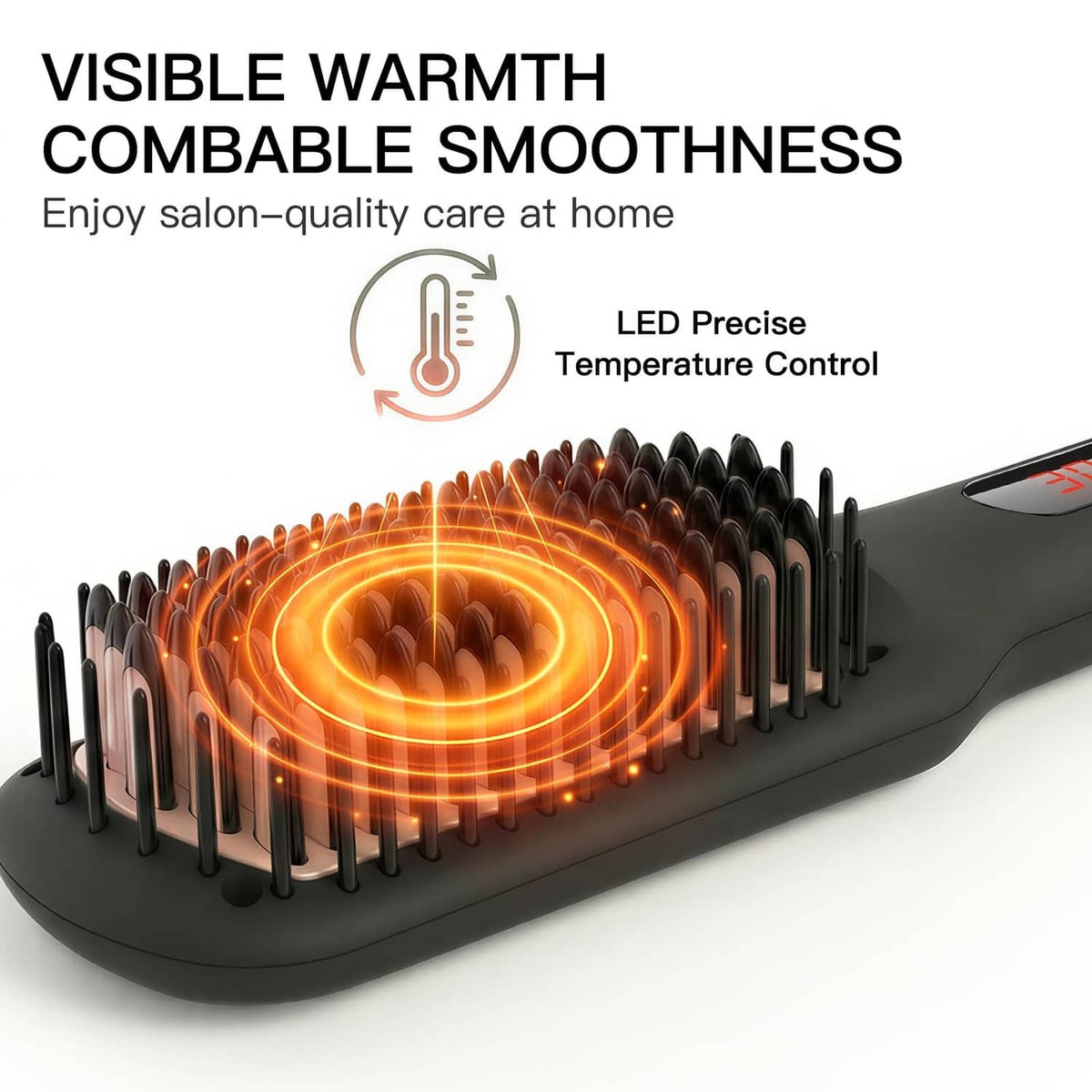 Black heated straightener brush with visible warm glow under comb teeth
