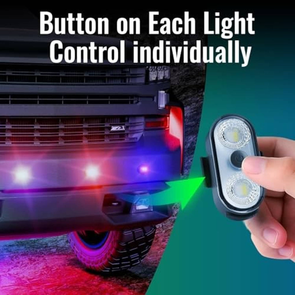 Hand pressing black button on dual-lens clip-on LED car interior light