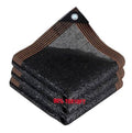 Outdoor shade mesh tarp, folded black fabric with reinforced brown edge and corner grommet