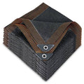 Black mesh shade cloth tarp, folded with brown trim and reinforced metal grommets