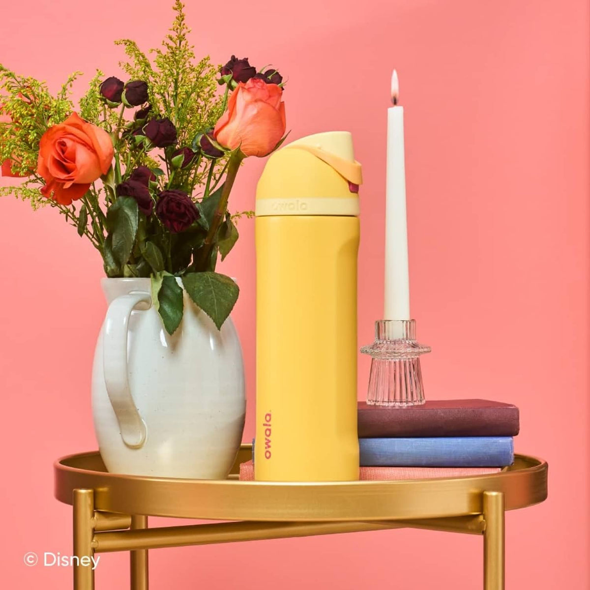Yellow insulated stainless steel water bottle standing upright