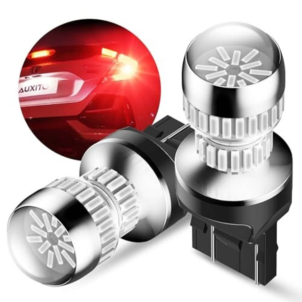 Red LED strobe brake light bulbs, showing front projector lens and black power plug