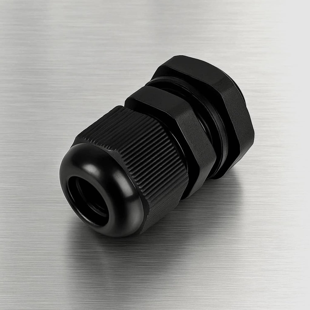 Black nylon cable cord grip with fluted tightening ring and wide cable opening