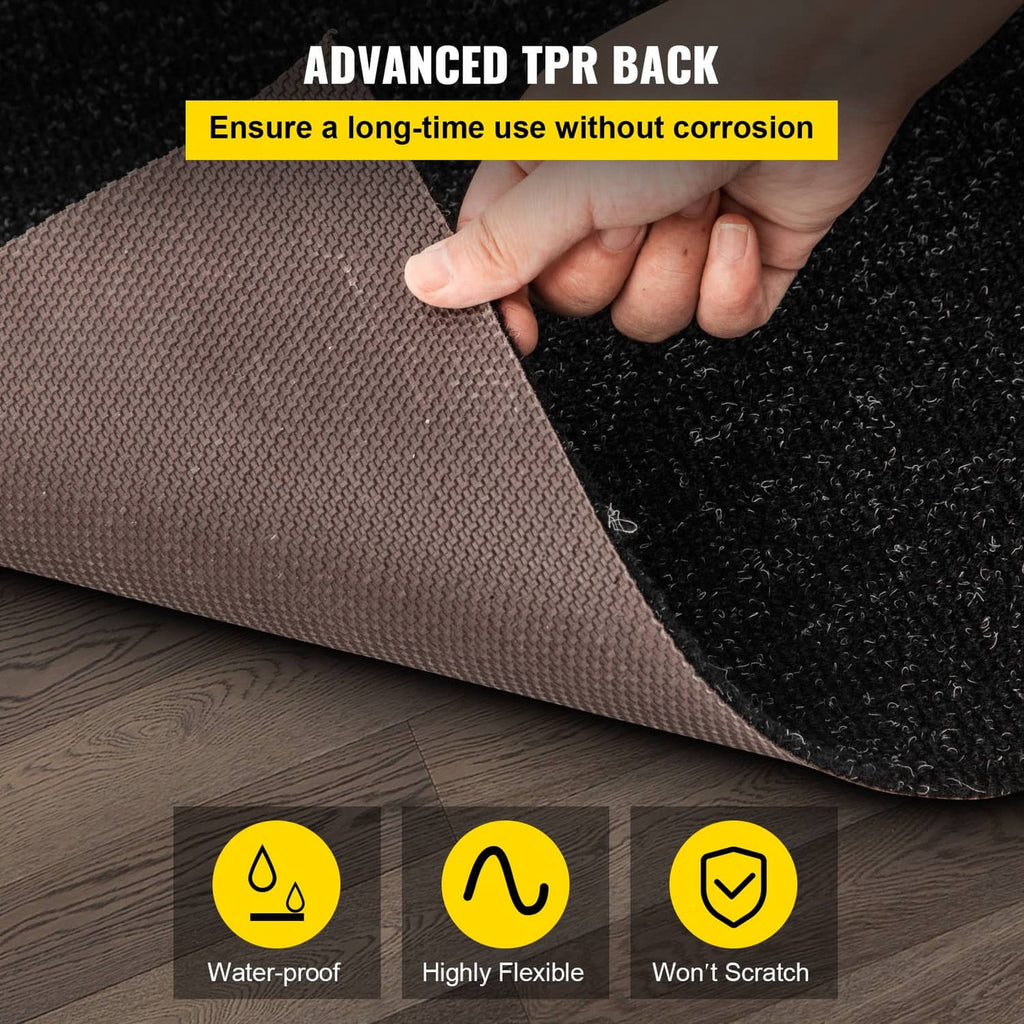 Charcoal black marine carpet corner being lifted, showing flexible top layer