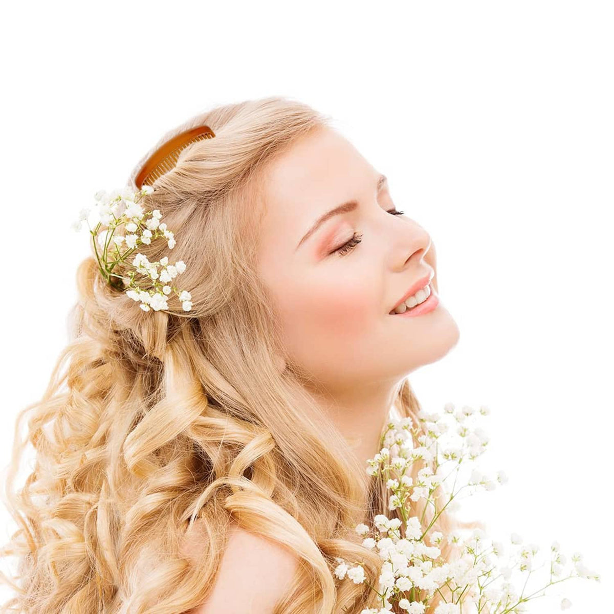 Plastic hair side comb with amber teeth, clipped into a blonde side updo