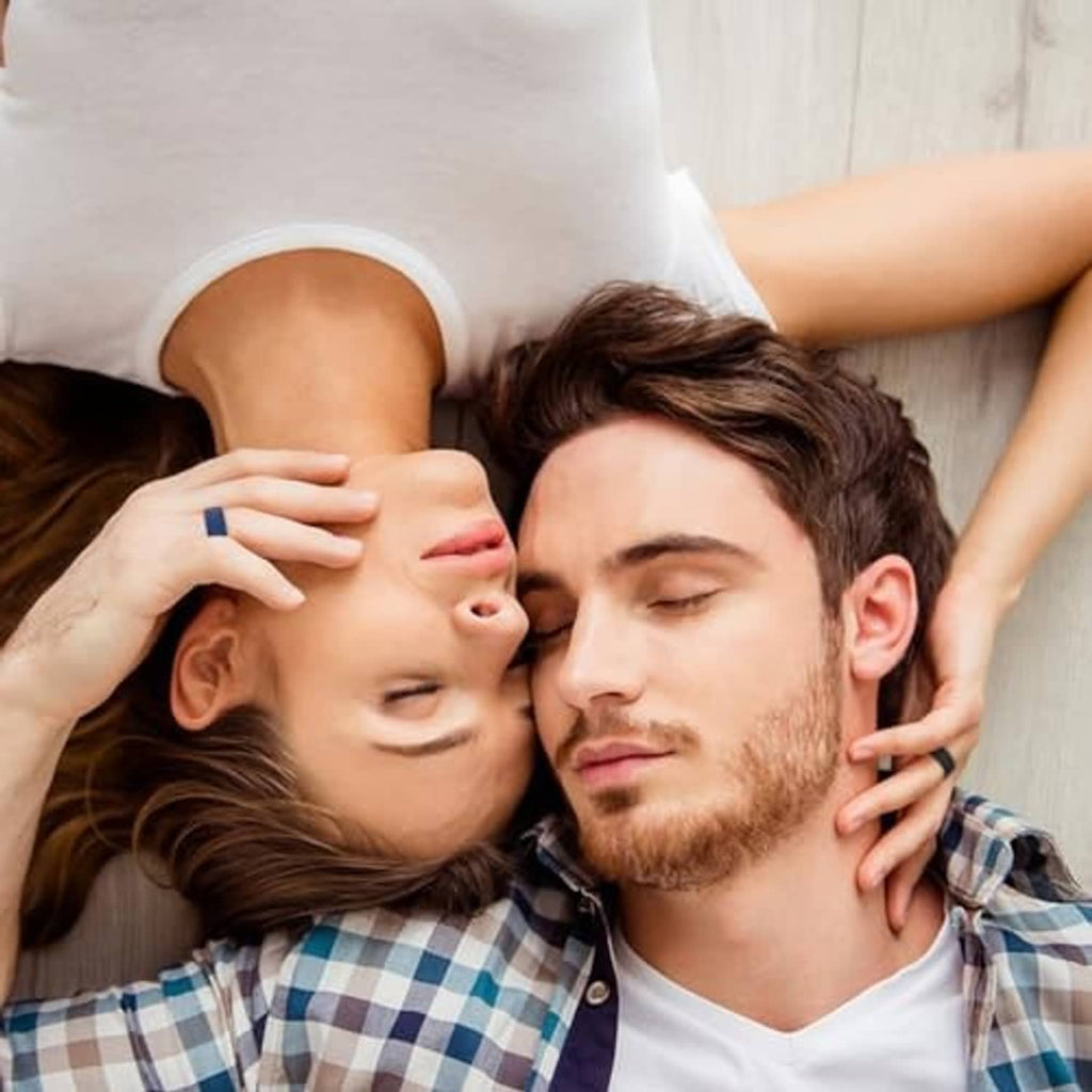 Two people resting; ring protectors are not visible in this frame.