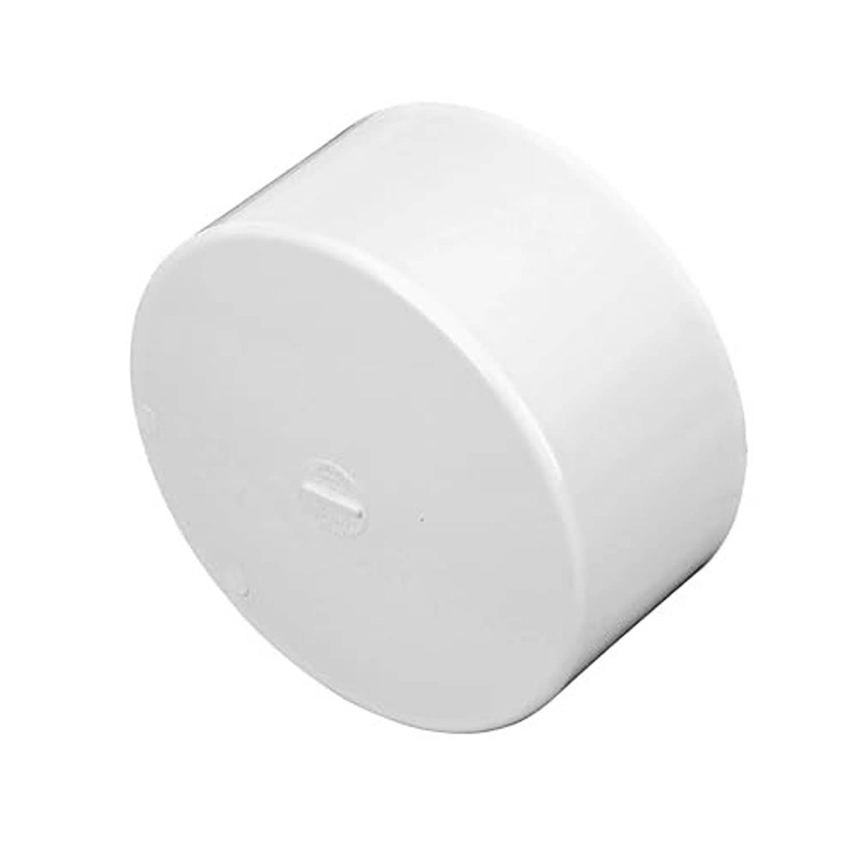 White 6-inch PVC S&D solvent-weld end cap, angled view