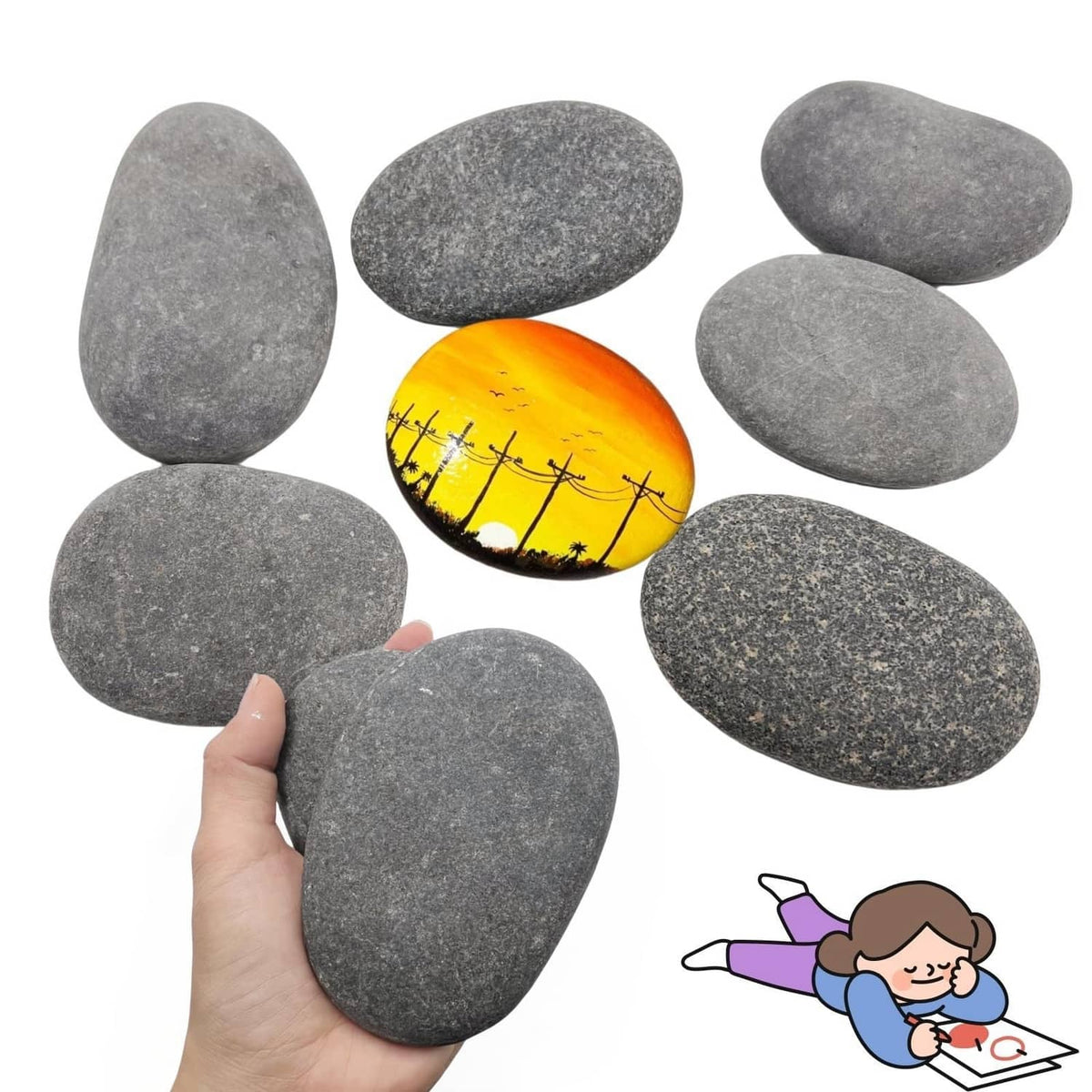 Gray oval river rocks with one painted rock featuring a sunset fence scene