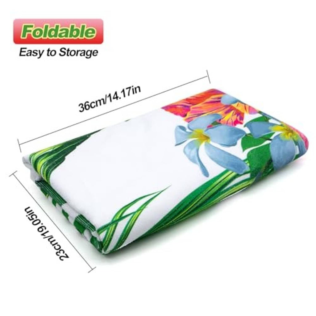 Folded flamingo and tropical leaf seat cover in white with multicolor print