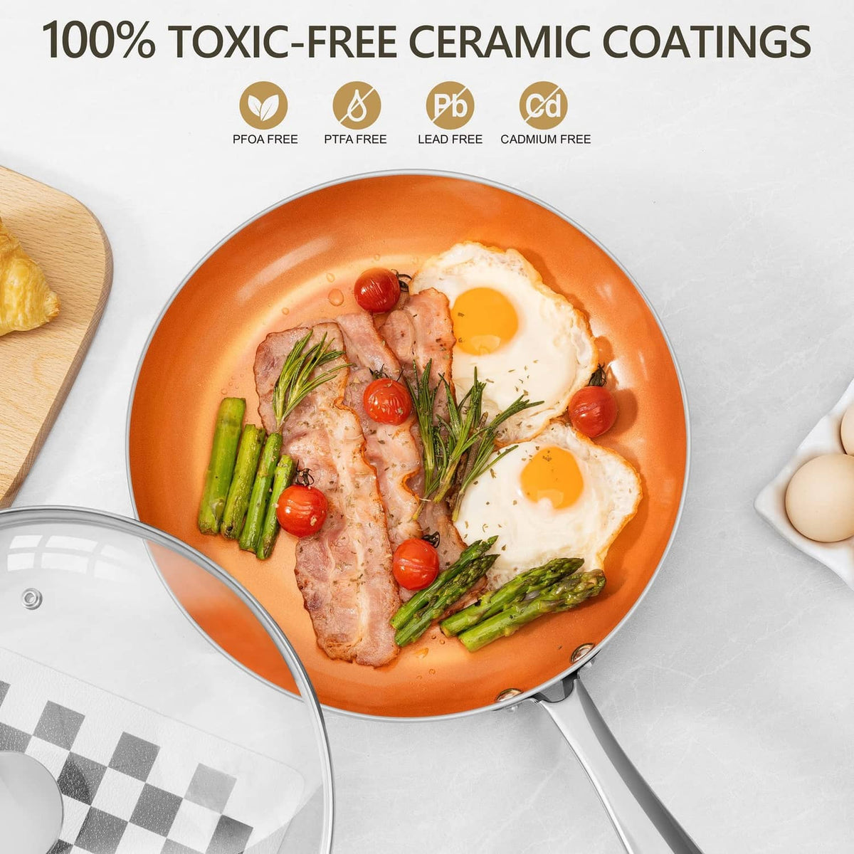 Orange nonstick frying pan with food inside and tempered glass lid edge, stainless handle