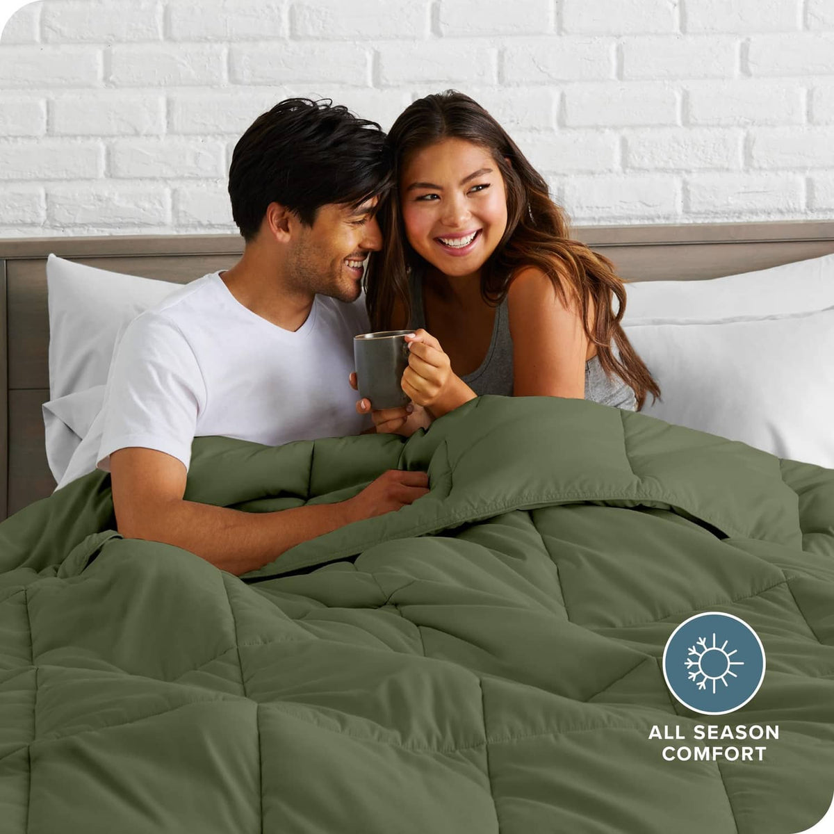 Cypress green comforter set with pillow shams on a bed