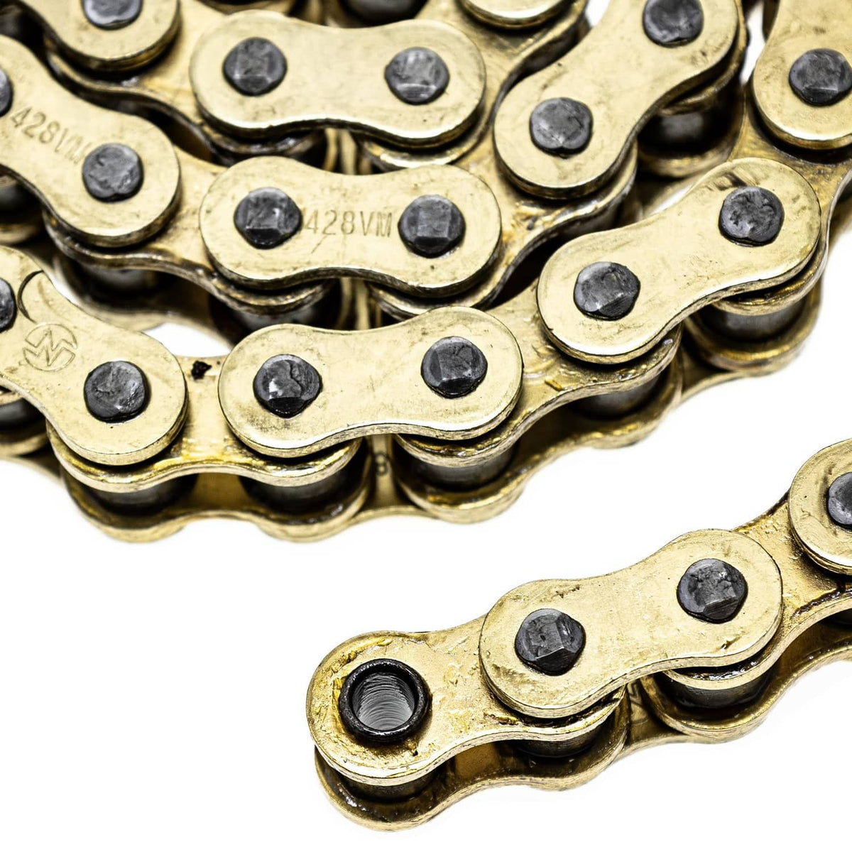 Close-up of gold X-ring drive chain links with black sealing O-rings