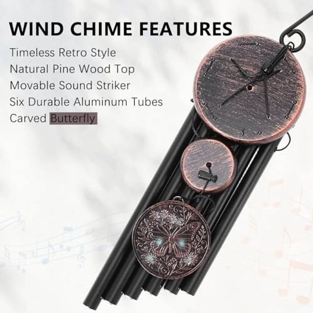 Retro wind chime with dark copper circular top and butterfly medallion over six tubes